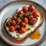 Whipped Ricotta Toast with Hot Honey and Roasted Cherry Tomatoes